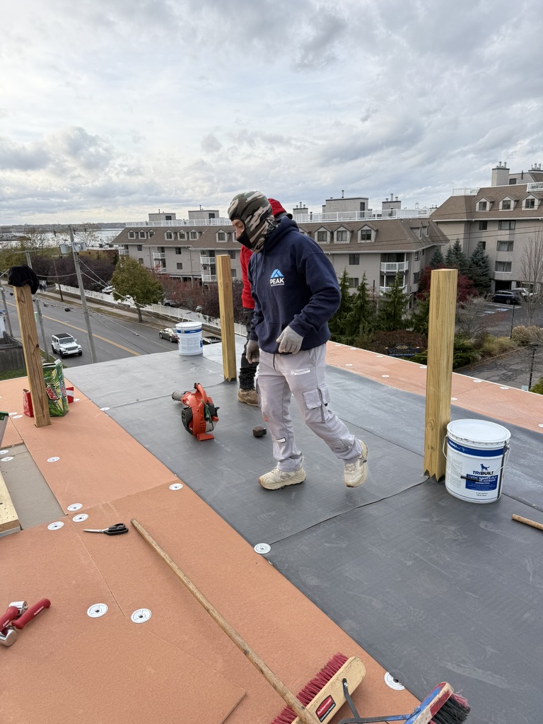 Historic Newport Renovation: EPDM Flat Roof Built to Battle the Coast