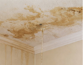 Interior water damage, showing water leaking and drywall stained